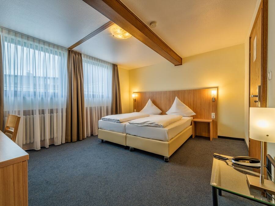 Family Room | Select Comfort beds, in-room safe, desk, soundproofing