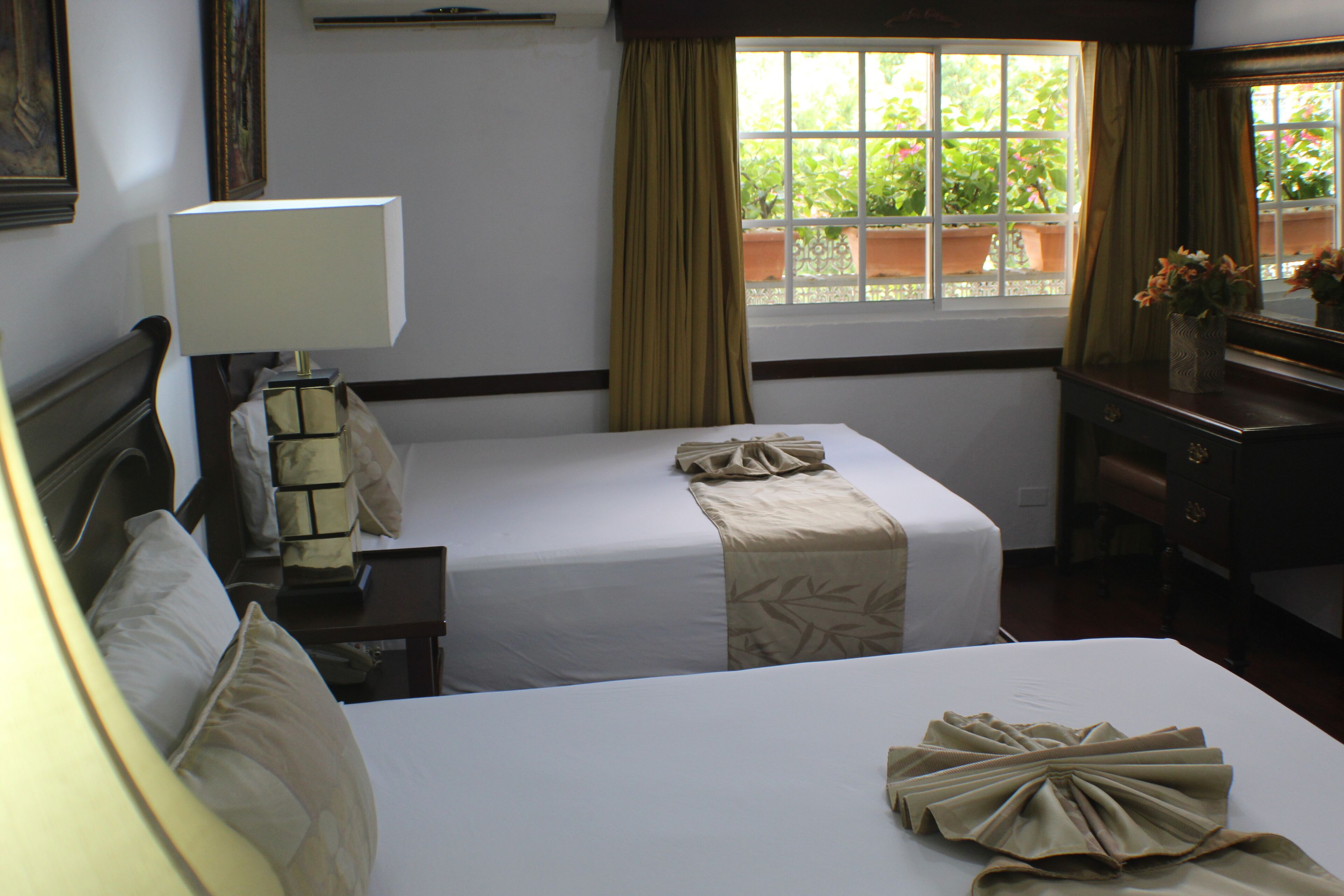 junior suite deluxe | minibar, in-room safe, blackout curtains, iron/ironing board