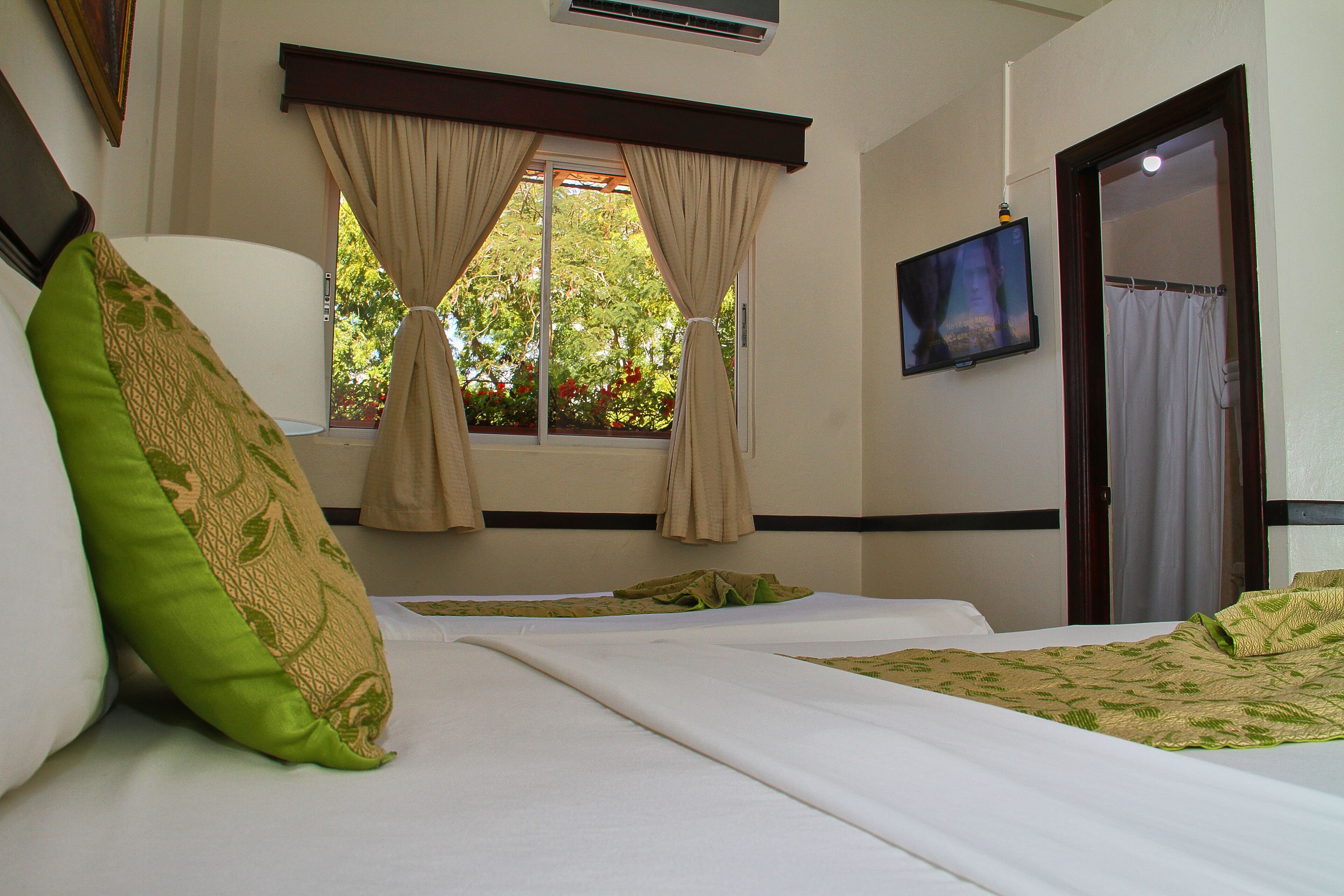 junior suite | minibar, in-room safe, blackout curtains, iron/ironing board