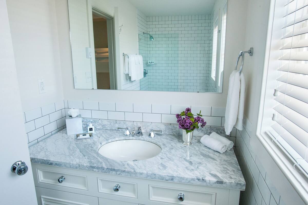 ocean terrace | bathroom | combined shower/bathtub, hair dryer, towels