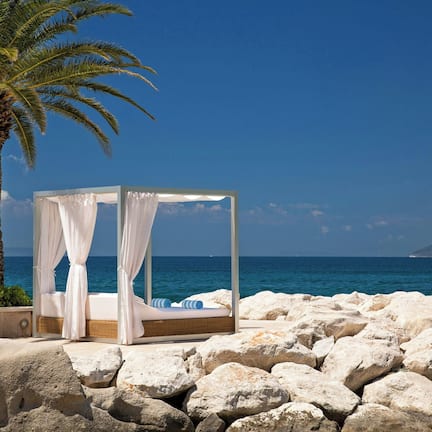 On the beach, scuba diving, snorkeling, water skiing