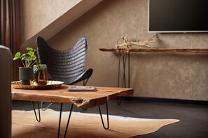 Suíte | Área de estar | TV de tela plana