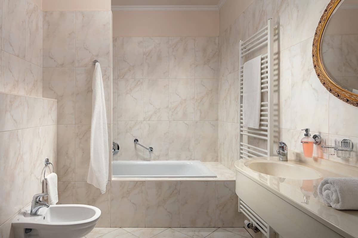 superior double room | bathroom | free toiletries, hair dryer, bathrobes, slippers