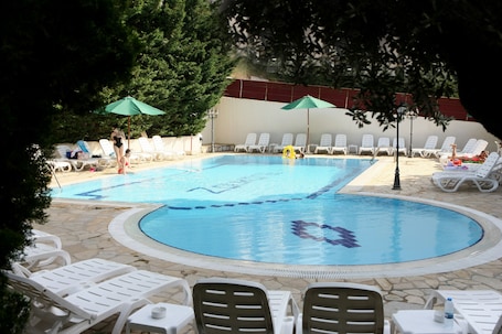 Outdoor pool, open 9 AM to 6 PM, sun loungers