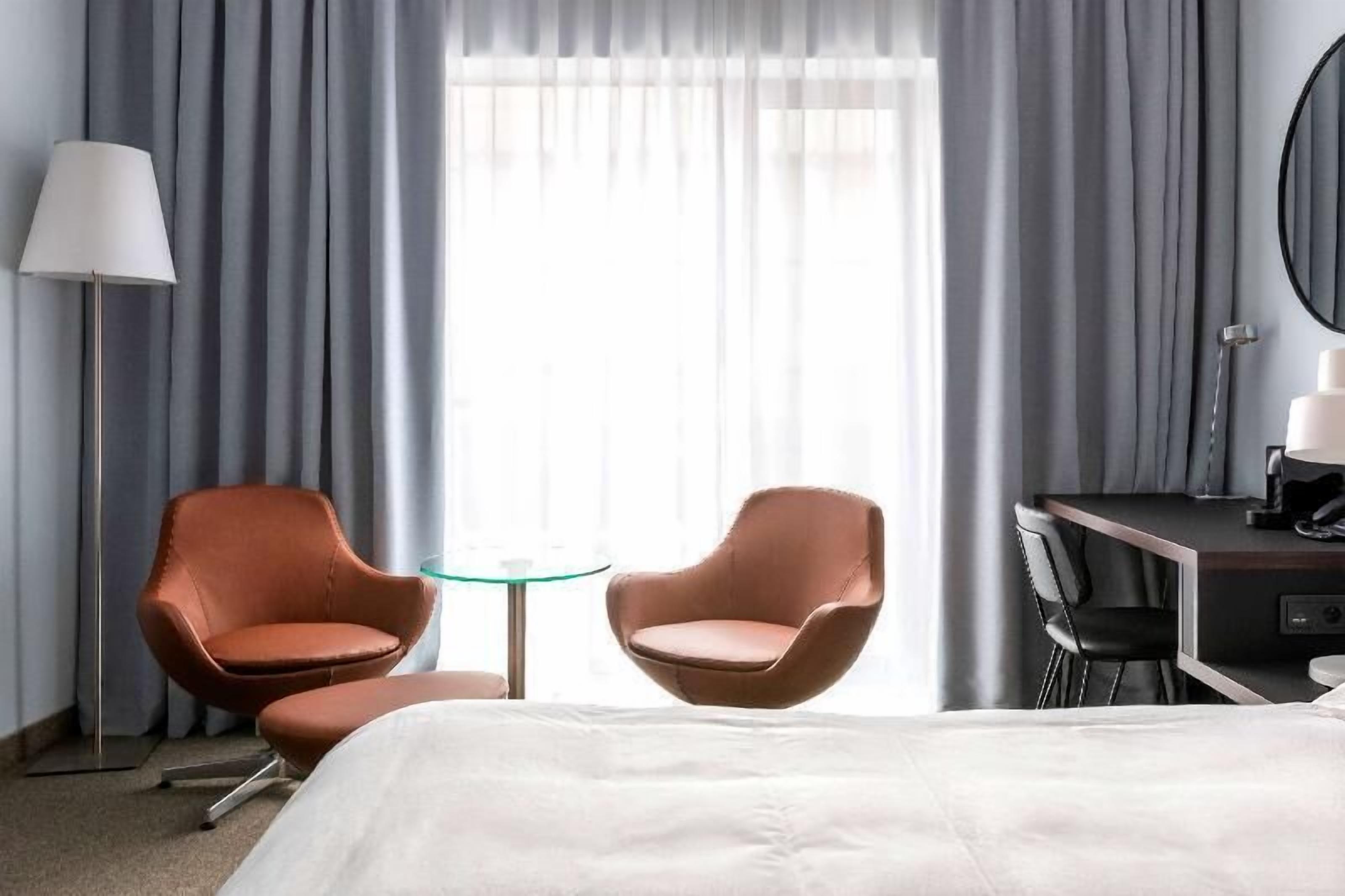 Literie de qualité supérieure, coffres-forts dans les chambres, bureau