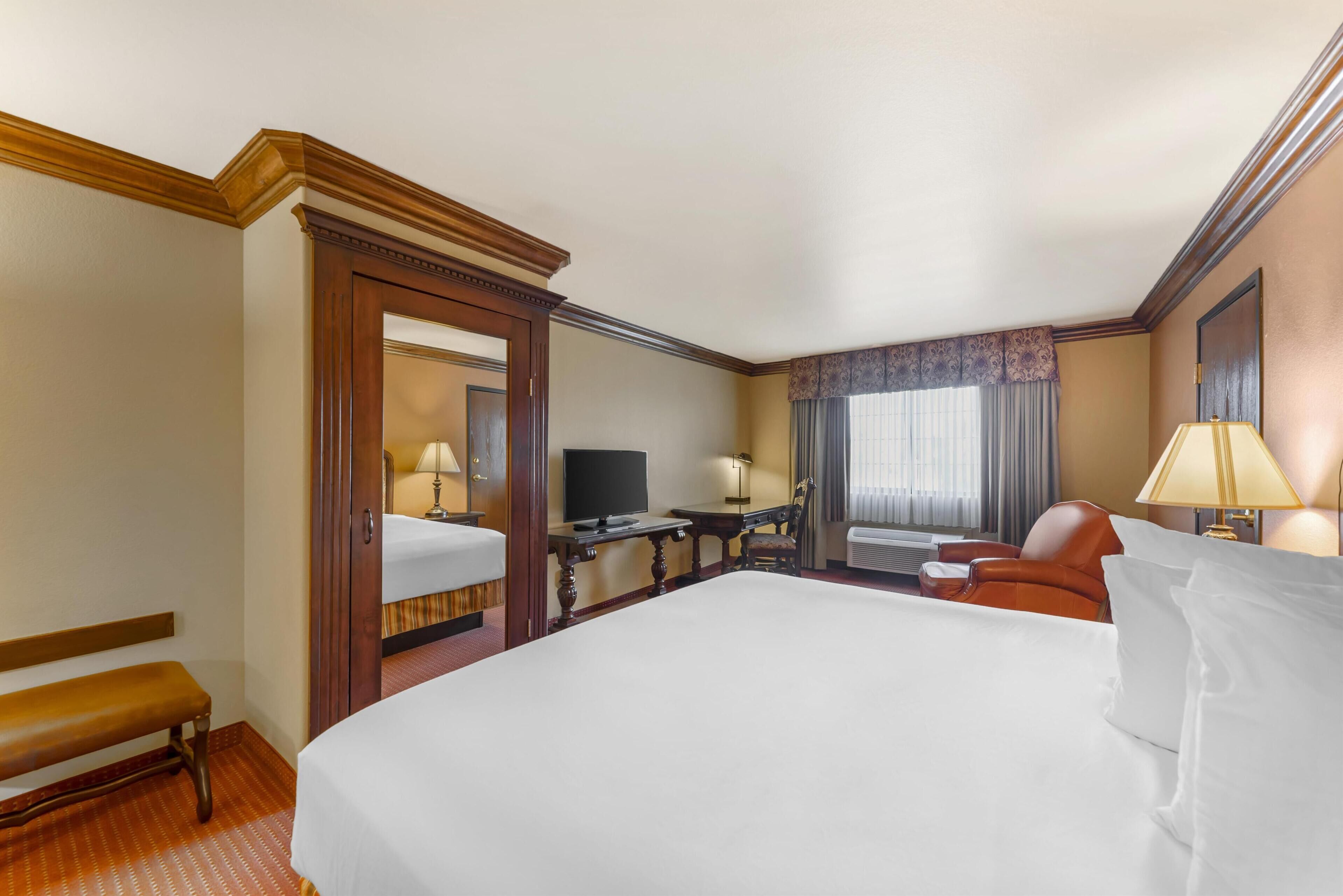 standard room, 1 king bed, non smoking, refrigerator & microwave | premium bedding, in-room safe, iron/ironing board, free cots/infant beds