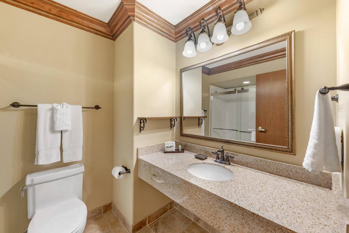 standard room, 1 king bed, non smoking, refrigerator & microwave | bathroom | designer toiletries, hair dryer, towels