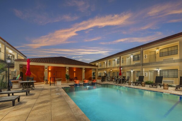 Outdoor pool, open 10:00 AM to 10:00 PM, pool umbrellas, sun loungers