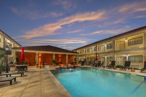 Outdoor pool, open 10:00 AM to 10:00 PM, pool umbrellas, sun loungers