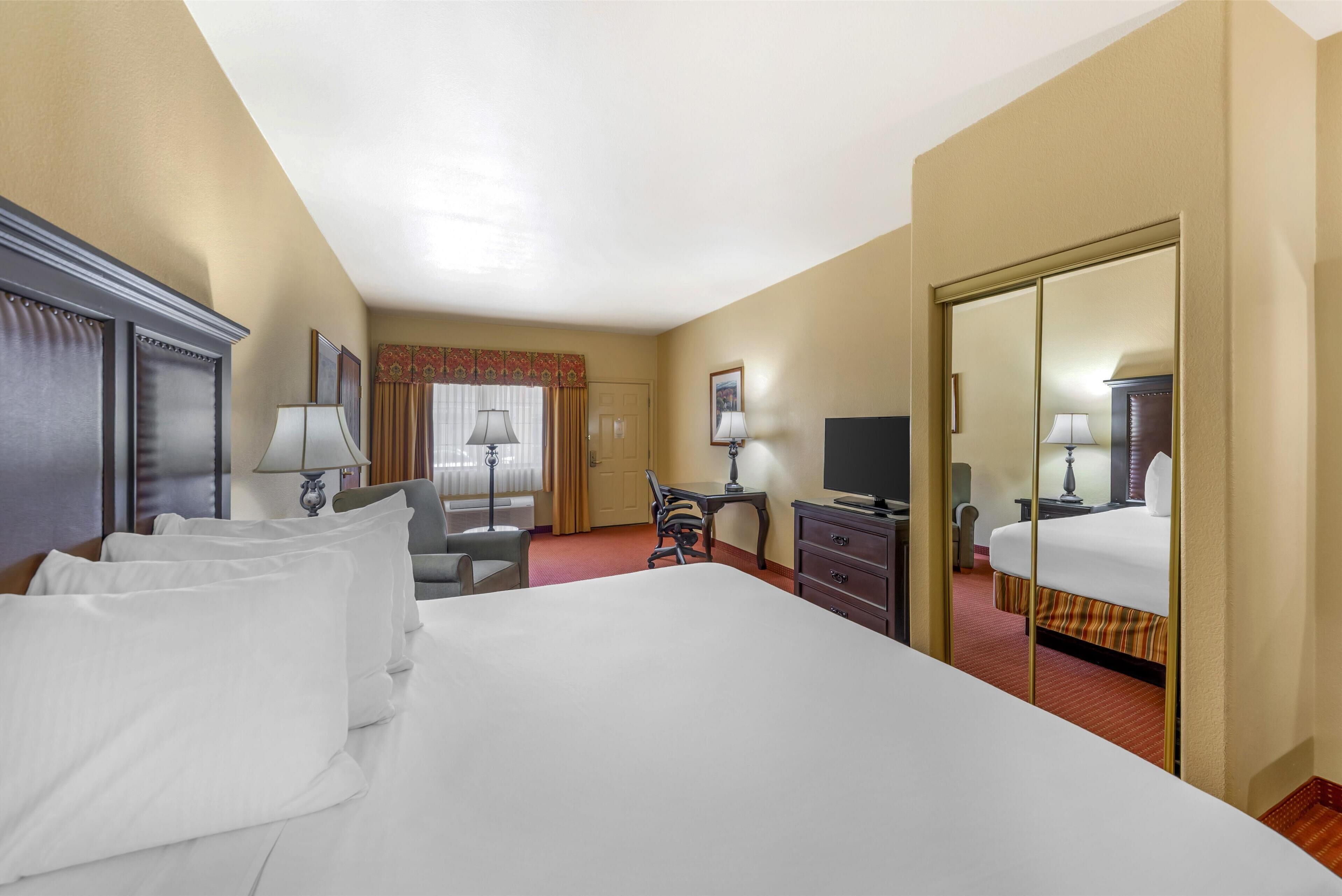 executive room, 1 king bed, non smoking, refrigerator & microwave | premium bedding, in-room safe, iron/ironing board, free cots/infant beds