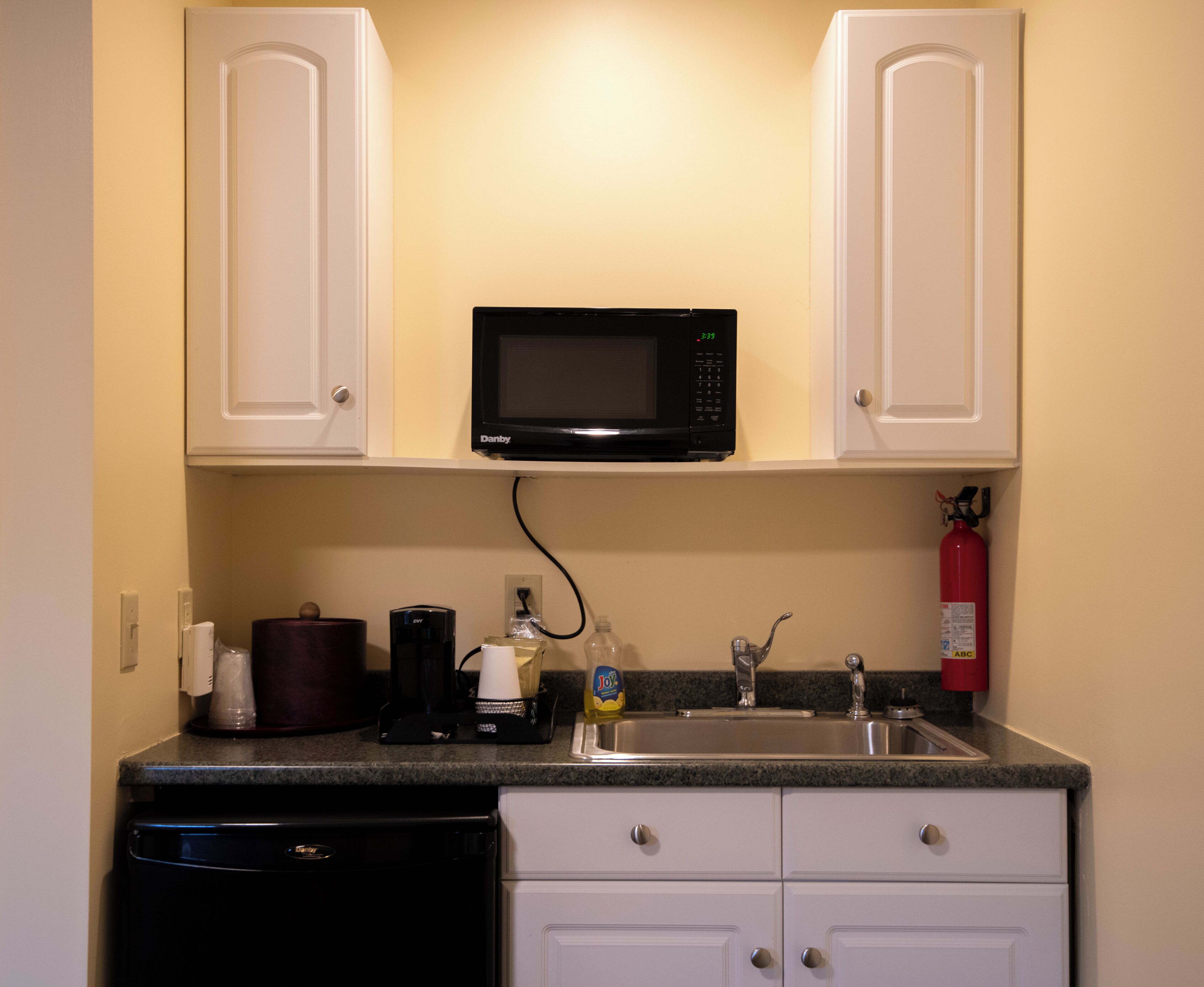 classic suite, 1 king bed | private kitchen | fridge, microwave, coffee/tea maker, eco-friendly cleaning products