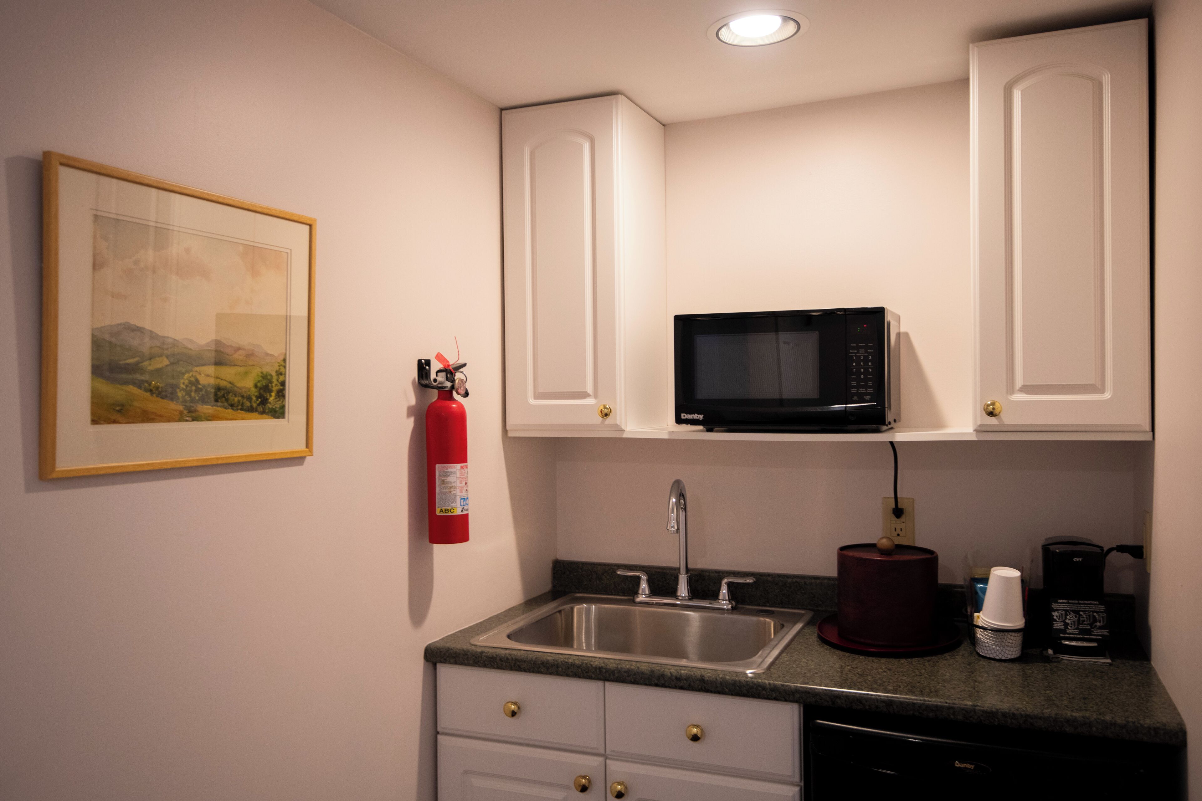 classic suite, 1 king bed | bathroom | eco-friendly toiletries, hair dryer, towels