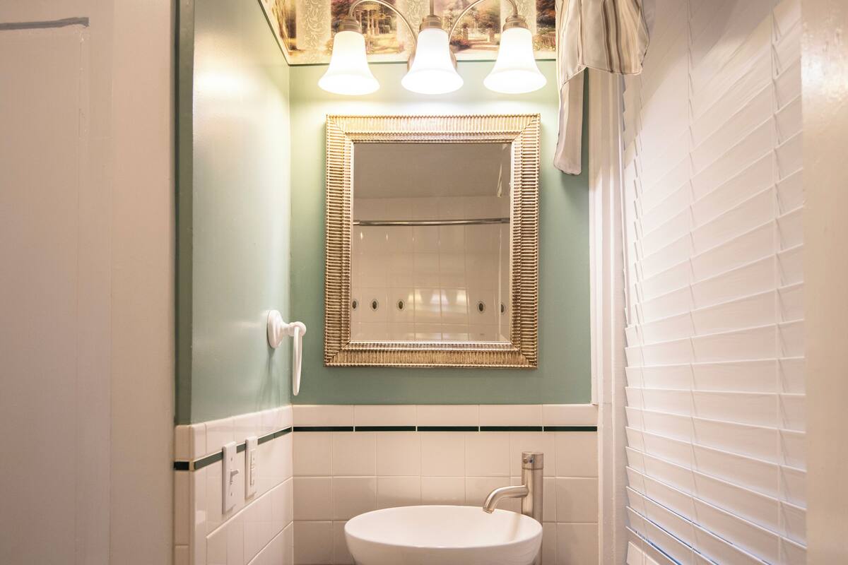 classic room, 1 king bed | bathroom | eco-friendly toiletries, hair dryer, towels