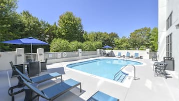 Seasonal outdoor pool, open 10:00 AM to 10:00 PM, pool umbrellas