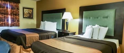 Camas con pillow-top, muebles diferentes y escritorio