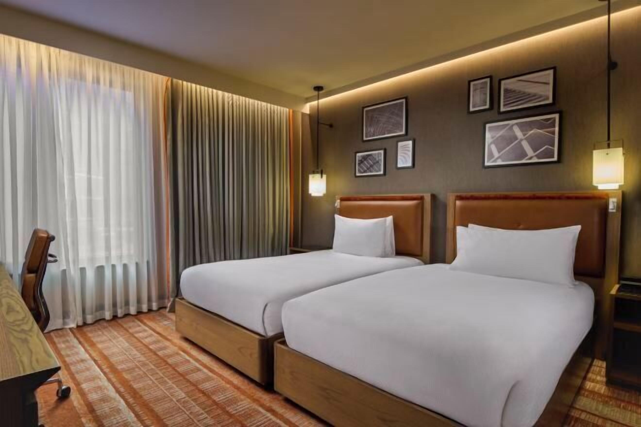 Literie hypoallergénique, coffres-forts dans les chambres, bureau