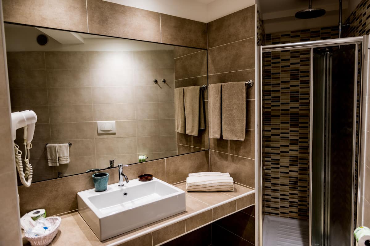 junior suite, balcony, sea view | bathroom | shower, rainfall showerhead, free toiletries, hair dryer
