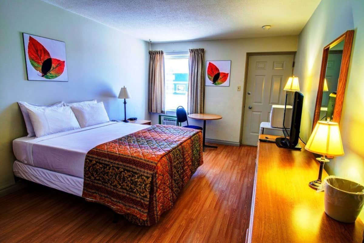Executive-Zimmer, 1 Queen-Bett | Schreibtisch, Bügeleisen/Bügelbrett, Babybetten, Zustellbetten