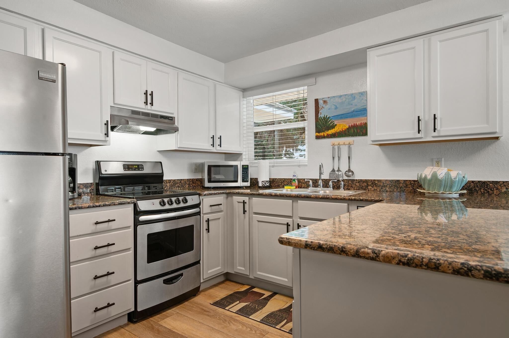 beachside one bedroom suite | private kitchen | fridge, microwave, stovetop, coffee/tea maker