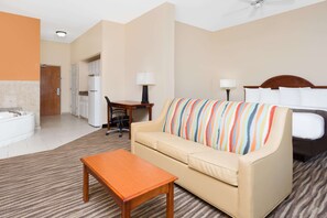 Suite, 1 King Bed, Jetted Tub | In-room safe, laptop workspace, blackout drapes, soundproofing - Baymont by Wyndham Augusta Riverwatch (Augusta)