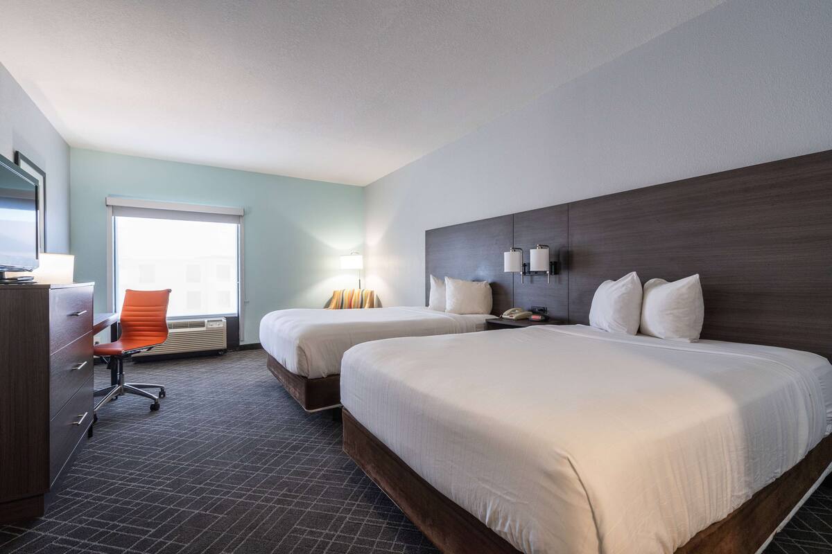 standard room, 2 queen beds | in-room safe, laptop workspace, blackout curtains, soundproofing