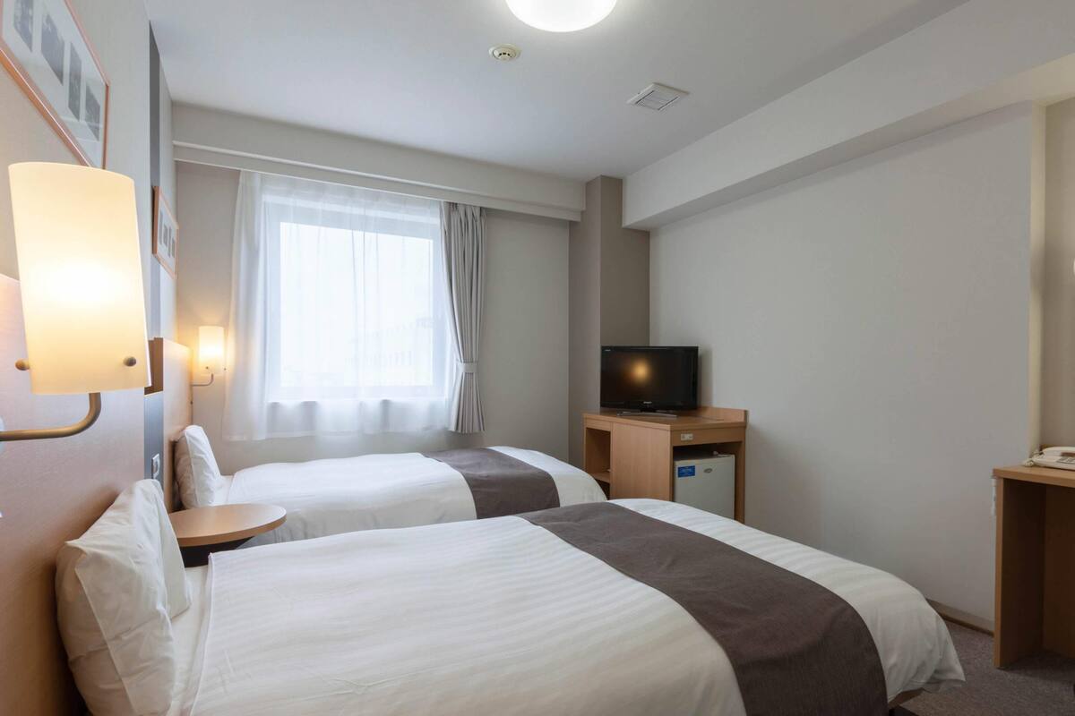 Chambre Standard avec lits jumeaux, 2 lits une place, non-fumeurs | Bureau, espace de travail pour ordinateur portable, Wi-Fi gratuit