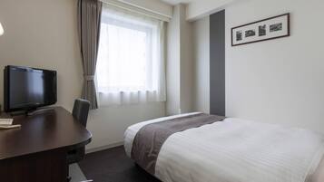 Desk, laptop workspace, free WiFi, bed sheets