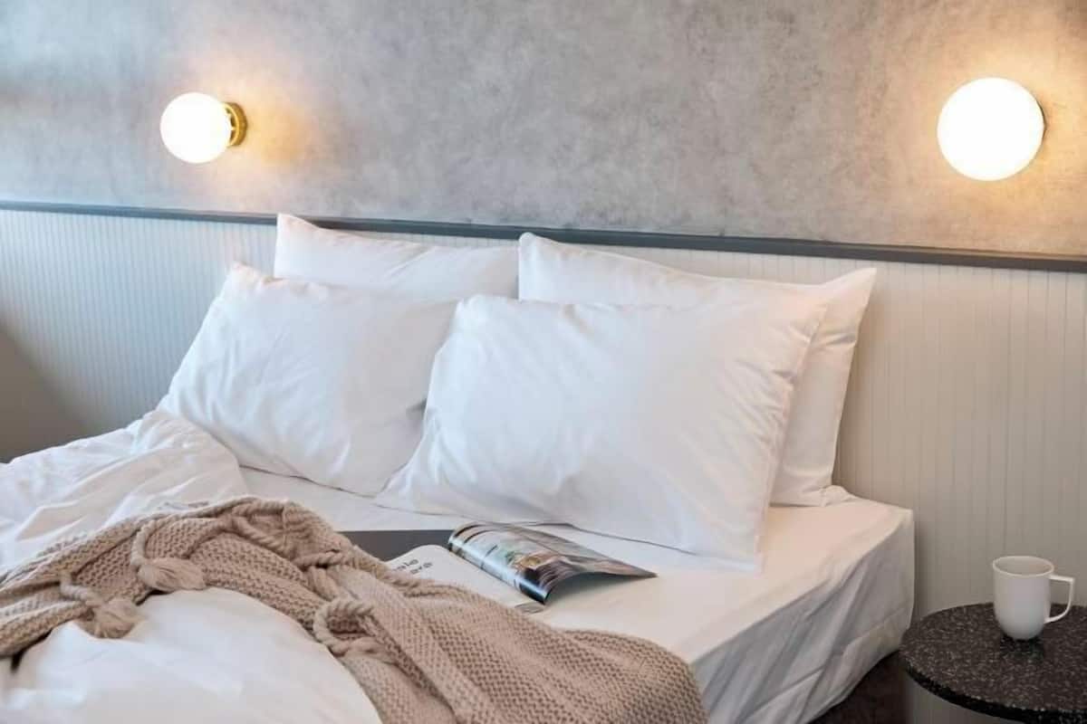 Minibar, desk, blackout curtains, bed sheets