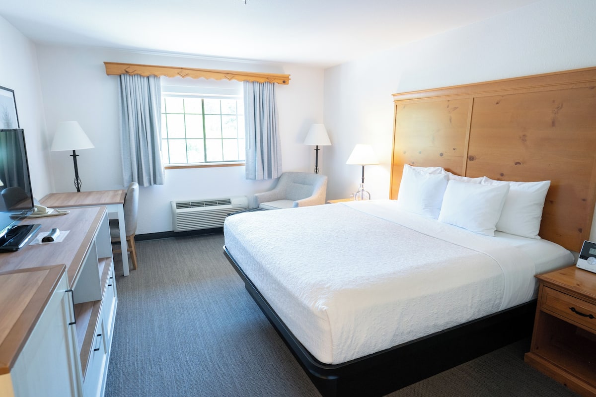 Alphine King | Premium bedding, pillowtop beds, blackout drapes, iron/ironing board
