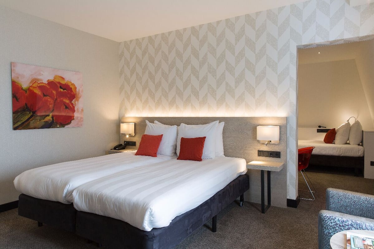 Family Room | 1 bedroom, in-room safe, desk, iron/ironing board