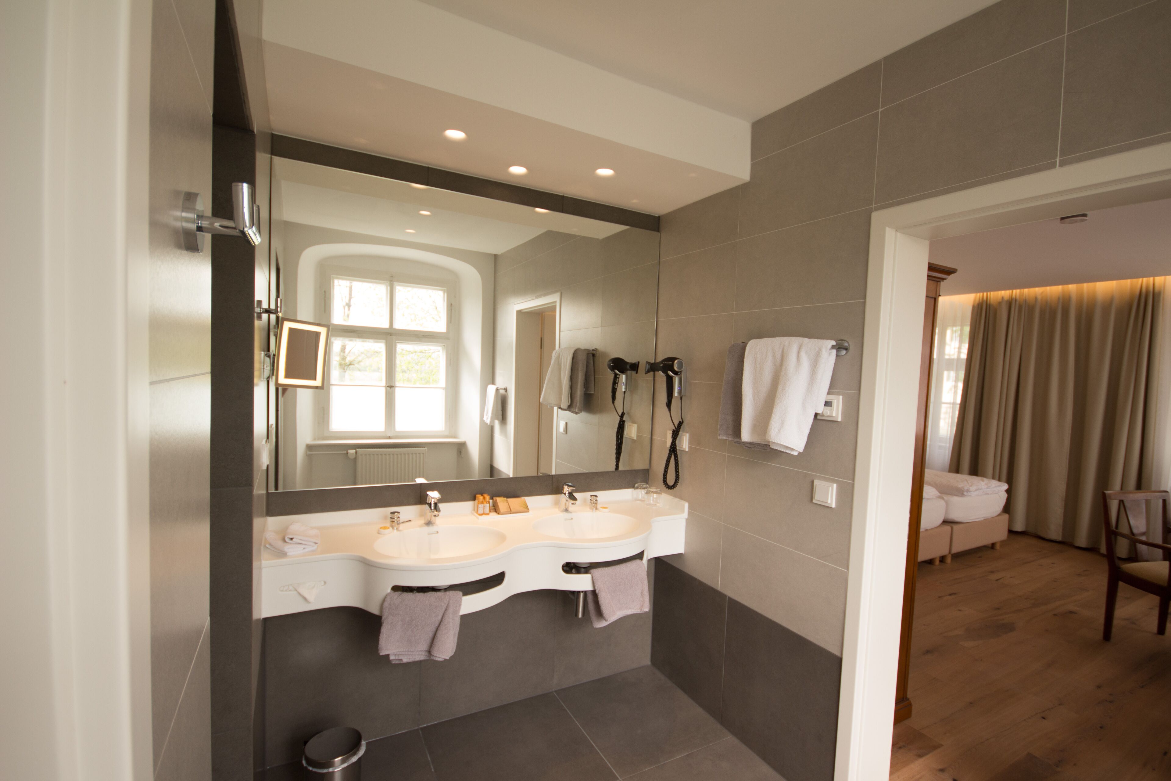 family suite (2 matresses in bed frame) | bathroom | separate bathtub and shower, rainfall showerhead, designer toiletries