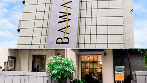 A building with a grid-patterned facade and a vertical sign reading "BAWA REGENCY". - Bawa Regency (Mumbai)