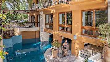 Seasonal outdoor pool, pool umbrellas, pool loungers