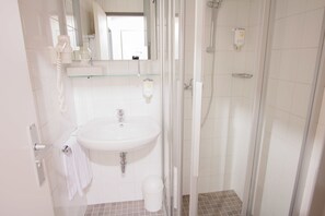 Shower, free toiletries, hair dryer, towels