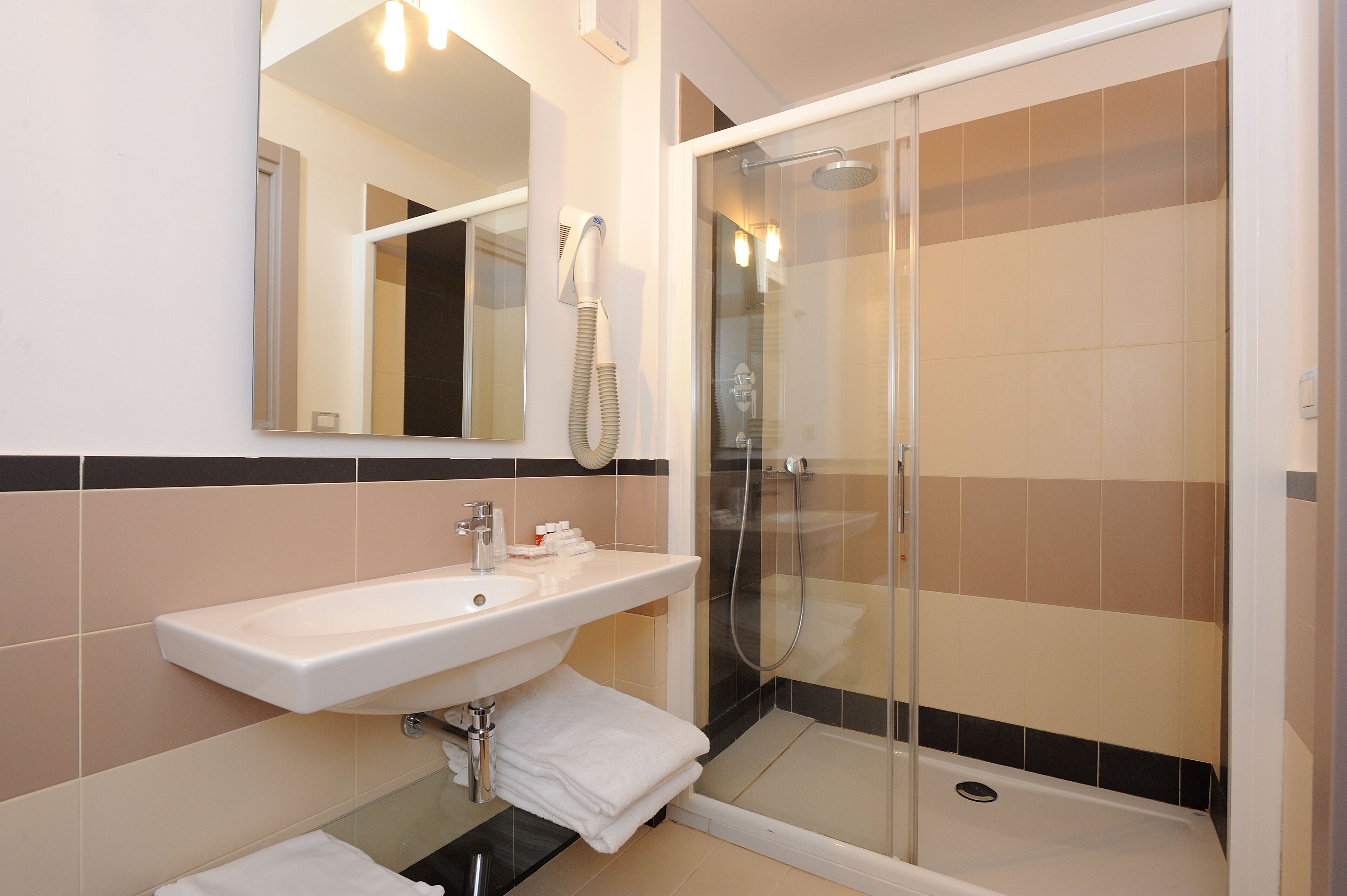 free toiletries, hair dryer, bidet, towels