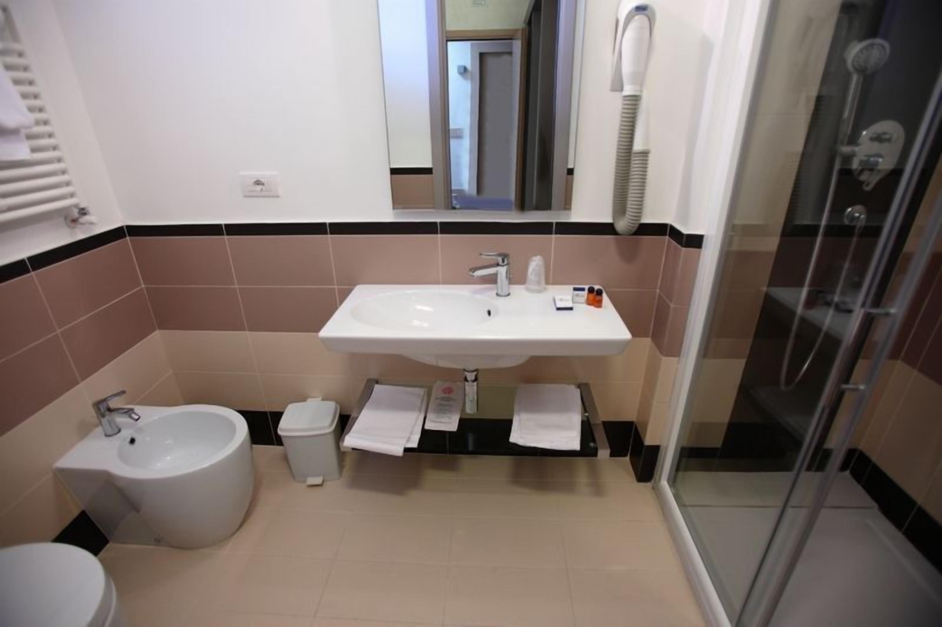 free toiletries, hair dryer, bidet, towels