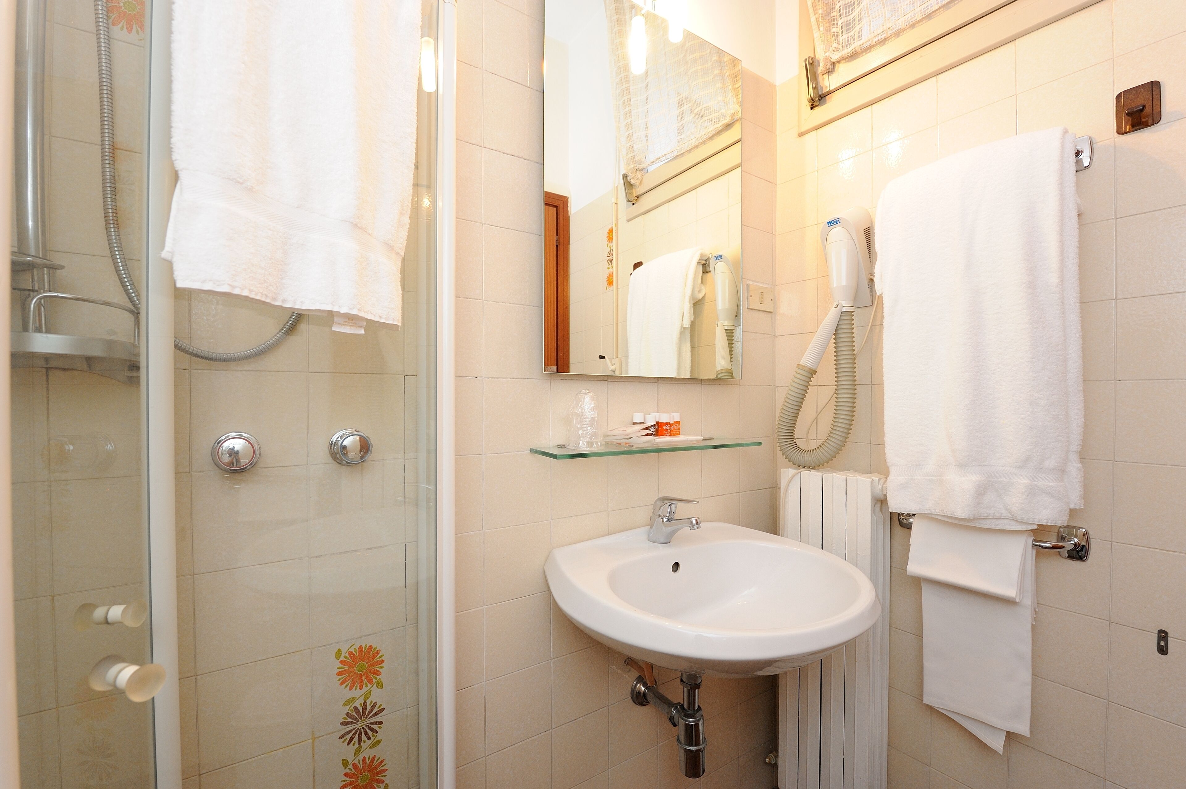 free toiletries, hair dryer, bidet, towels