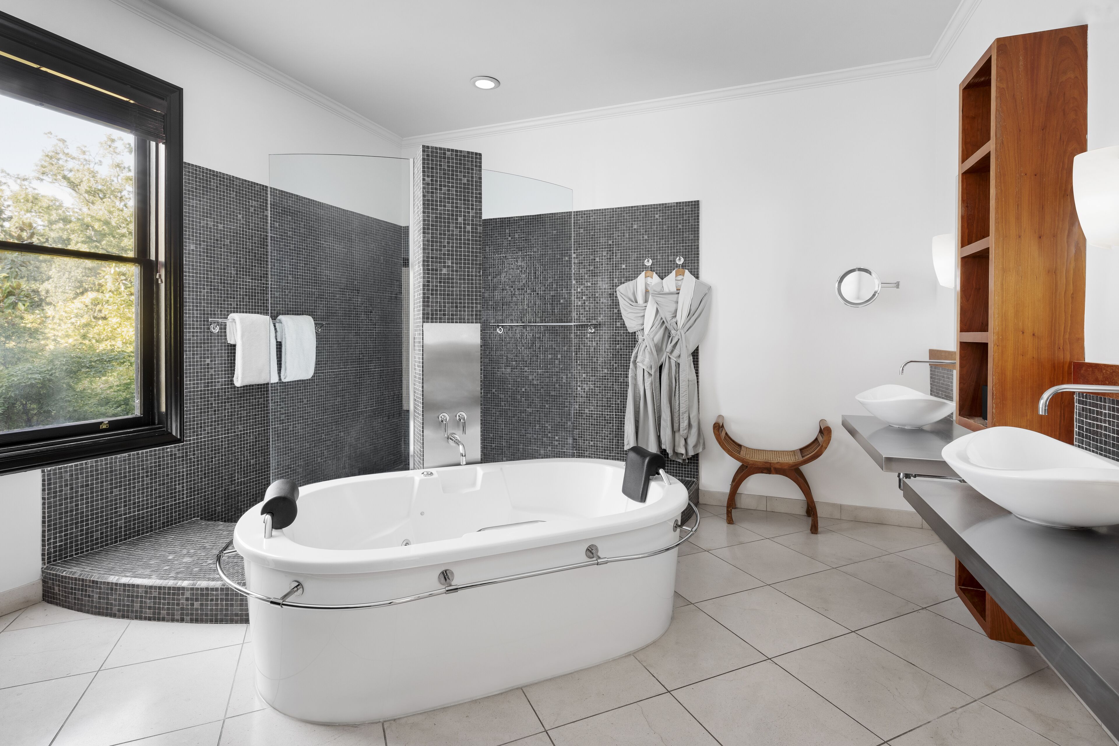 gaige suite | bathroom | designer toiletries, hair dryer, bathrobes, towels