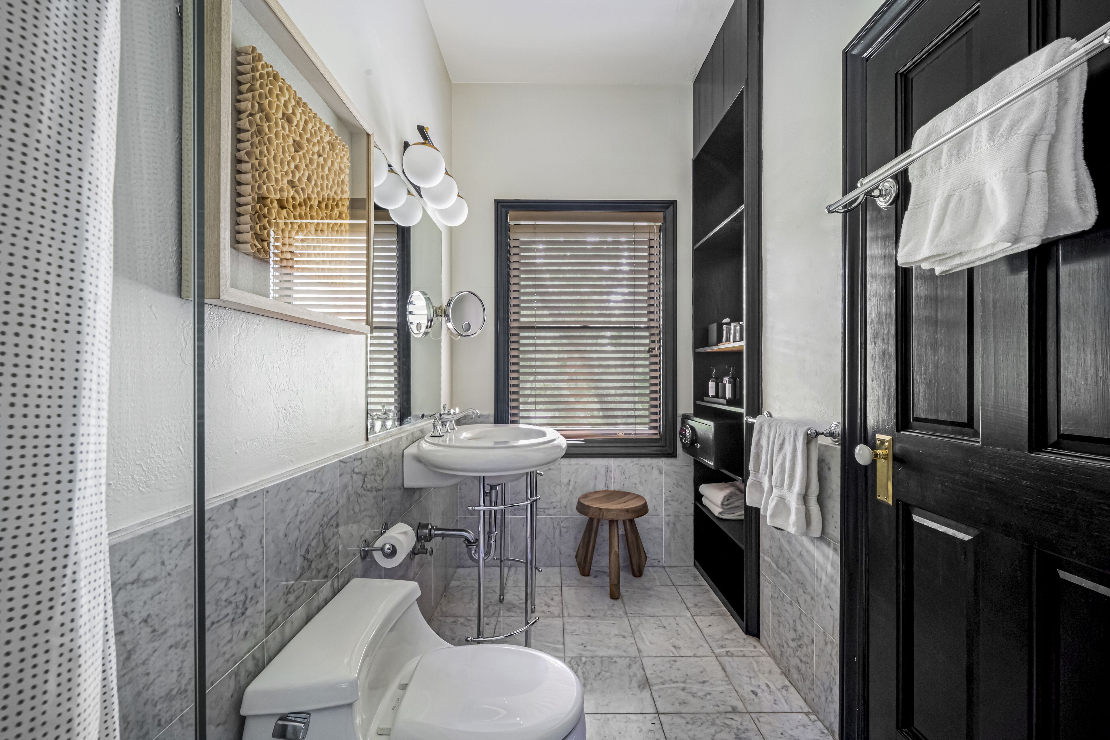 deluxe king | bathroom | designer toiletries, hair dryer, bathrobes, towels