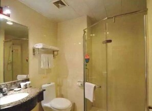 Shower, free toiletries, hair dryer, slippers