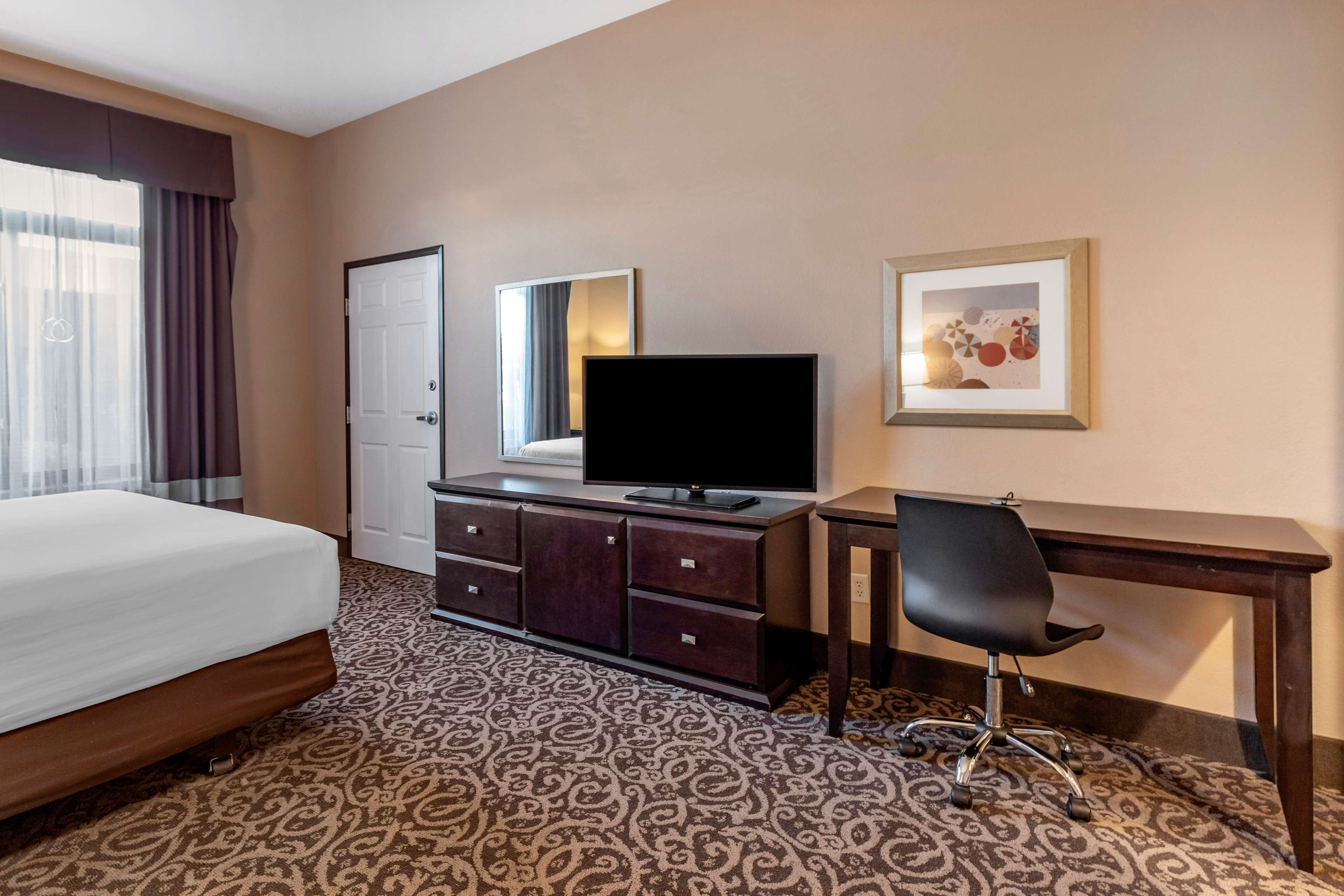 Hypo-allergenic bedding, pillow-top beds, desk, laptop workspace