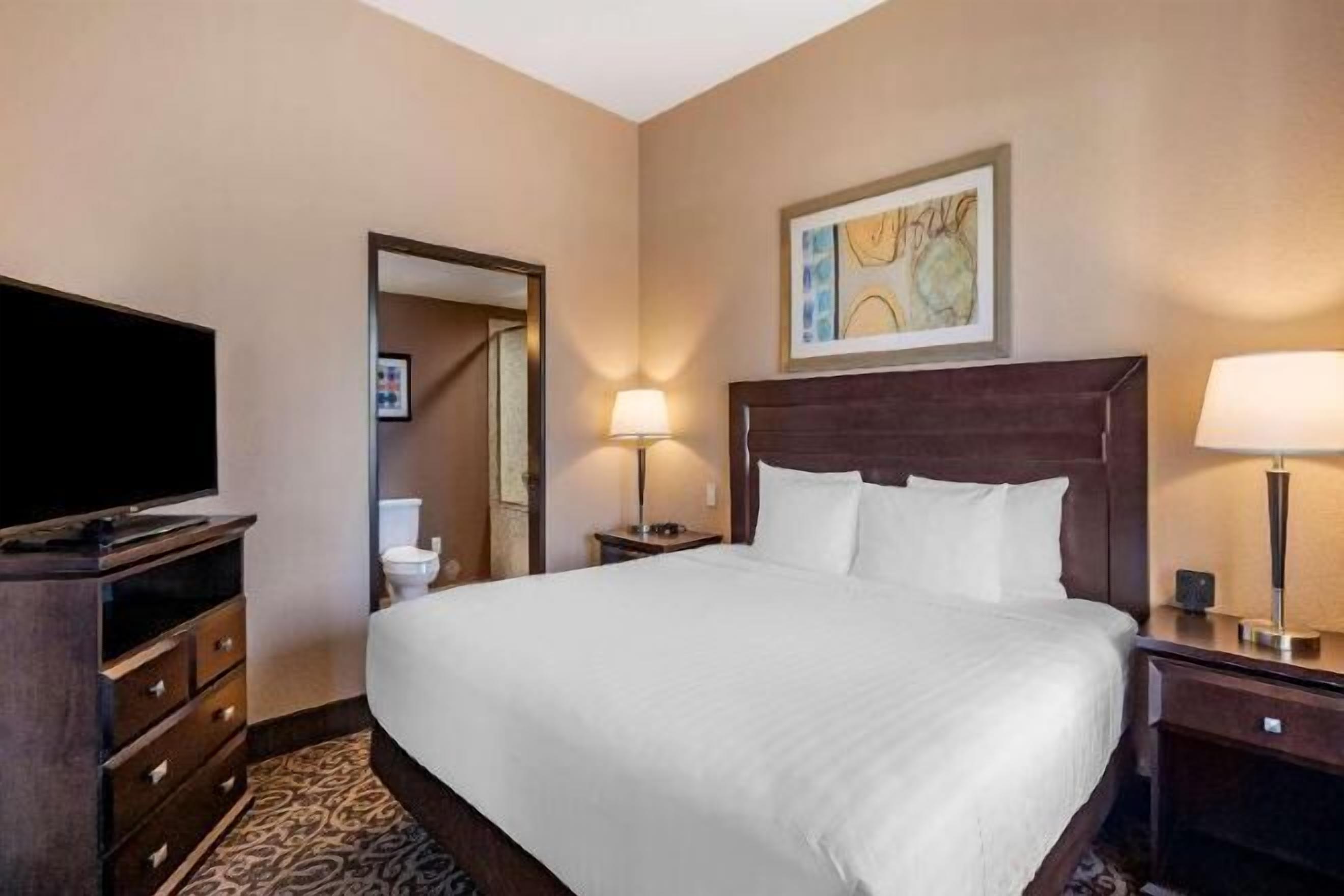 Hypo-allergenic bedding, pillowtop beds, desk, laptop workspace