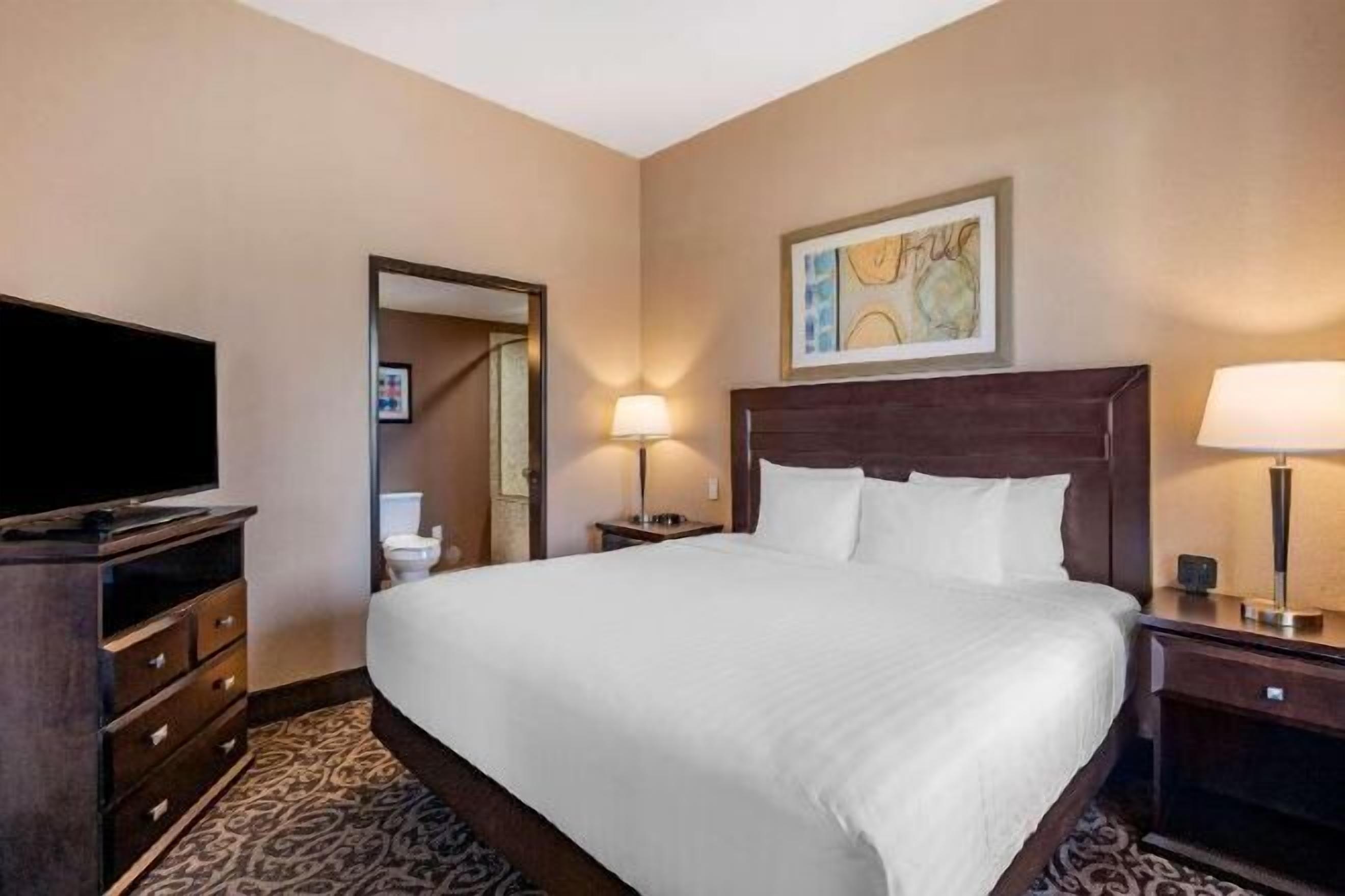 Hypo-allergenic bedding, pillow-top beds, desk, laptop workspace