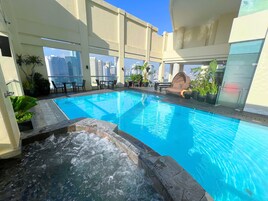 Outdoor pool, open 6:00 AM to 10:00 PM, sun loungers