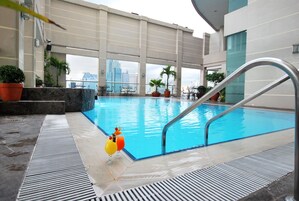 Outdoor pool, open 6:00 AM to 10:00 PM, sun loungers