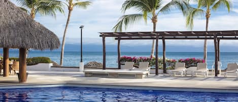 Outdoor pool, open 9:00 AM to 9:00 PM, pool umbrellas, sun loungers