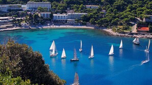 A coastal town with a marina filled with sailboats. - Hotel Uvala (Dubrovnik)