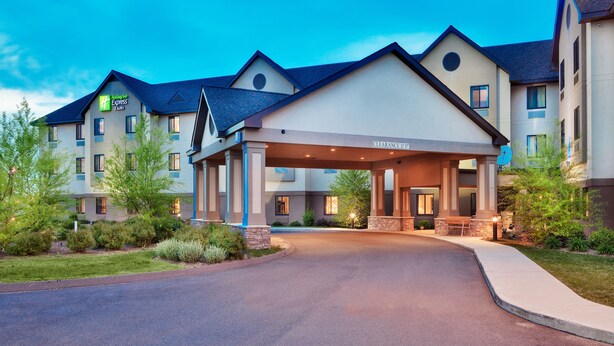 A Holiday Inn Express hotel with a covered entrance, multiple floors, and a landscaped driveway.