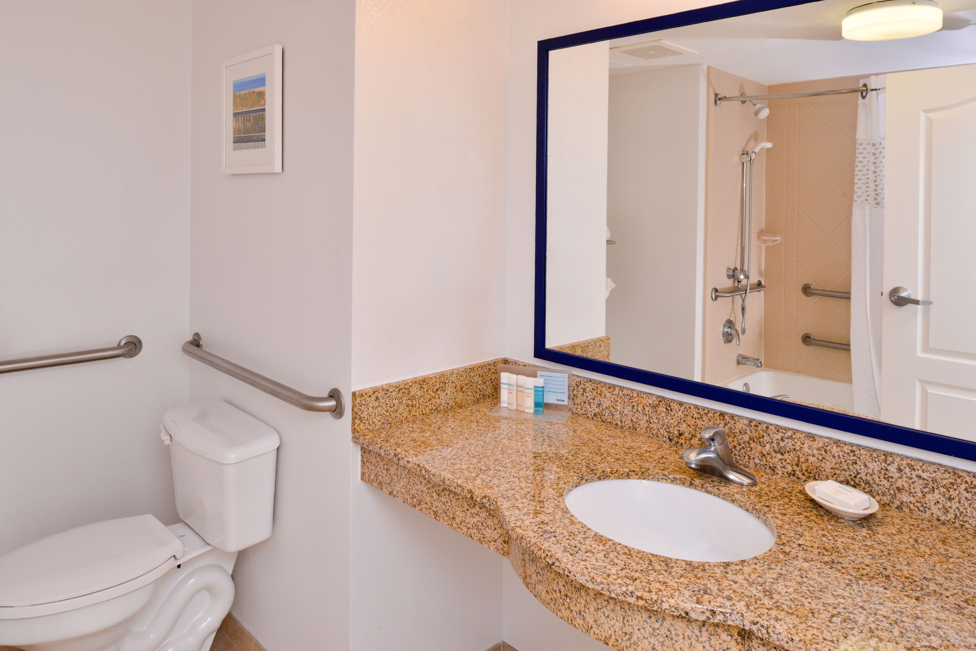 combined shower/bathtub, free toiletries, hair dryer, towels