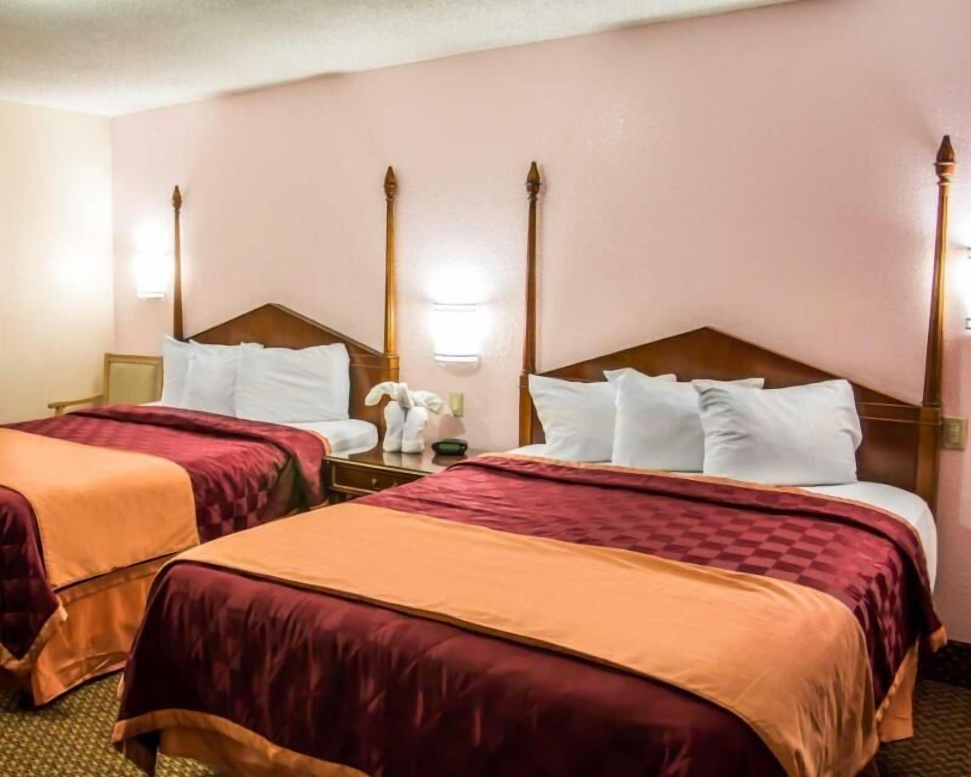 Pillowtop beds, desk, laptop workspace, blackout drapes